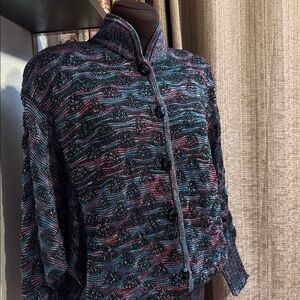 Vintage 1980/1990’s Oriana black multicolor long sleeve knit cardigan. Size L.